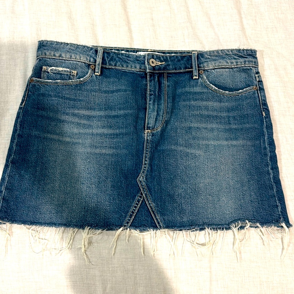 Used- excellent condition. Page denim mini skirt. Size 31